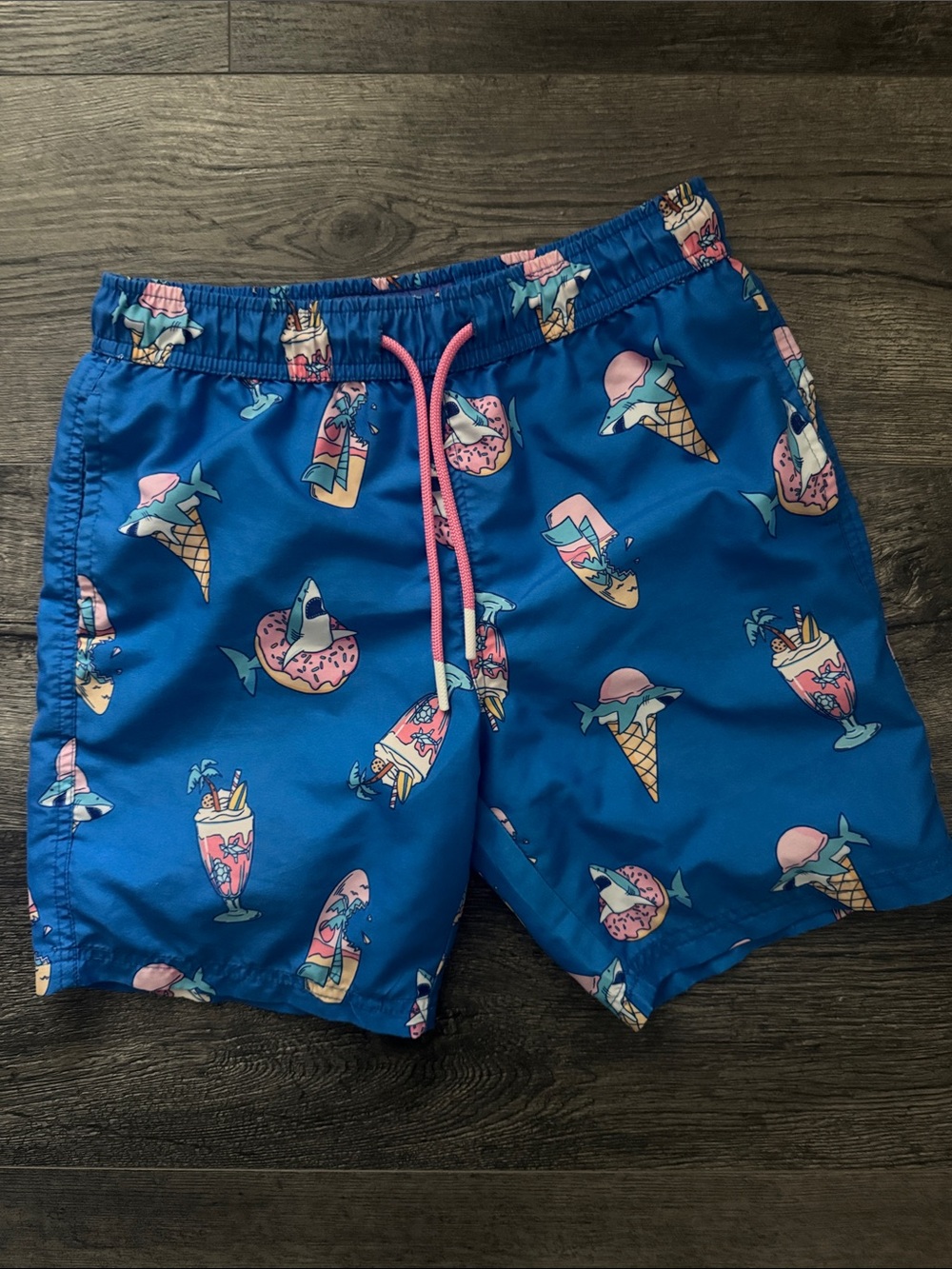 Kids Blue Tropical Treat Swim Trunks with Pink Accents Size 10
